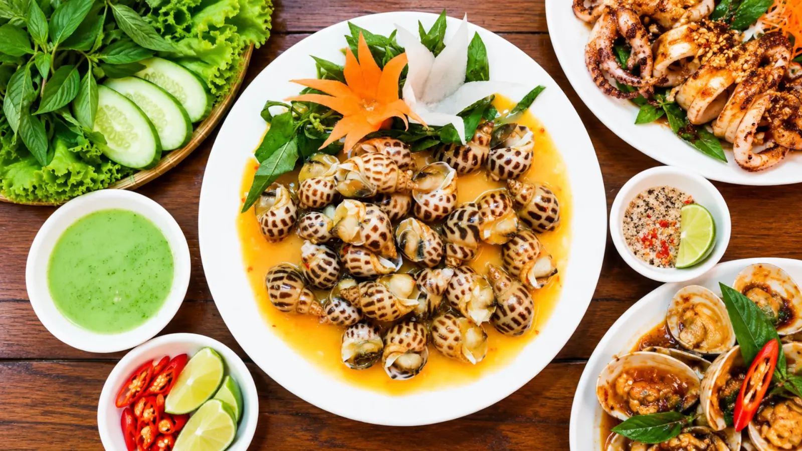 Ốc hương xào me món ăn kết hợp thịt ốc với nước sốt