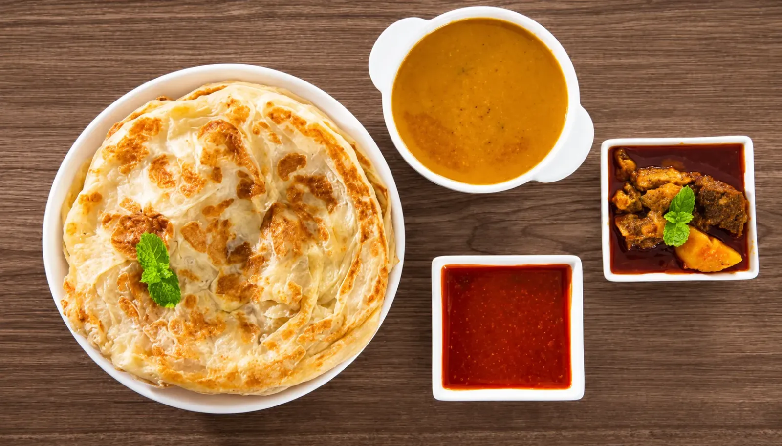 roti-canai-banh-det-nhieu-lop-an-kem-ca-ri-hap-dan